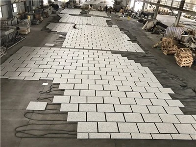 Witte granieten straatstenen